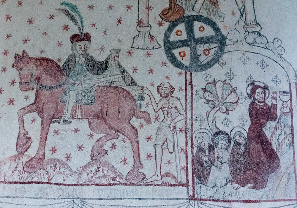Den hellige Martin av Tours deler kappen sin med et sverd. Kalkmaleri i Lye kirke på Gotland.